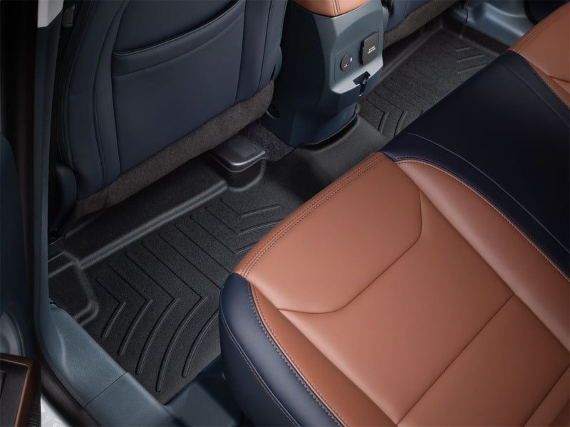WeatherTech 2022 Ford Maverick Hybrid Rear FloorLiner - Black installed in truck interior with leather seats.