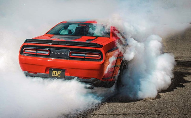 MagnaFlow Axle-Back, SS, 2.5in, Quad Split Rear 3.5in Tip 2015 Dodge Challenger 3.6L V6 burning rubber
