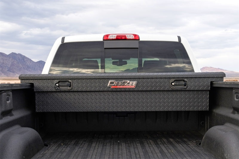 Deezee Universal Tool Box - Red Crossover - Single Lid Black BT Pull Handle (Low/Txt Blk) on truck bed