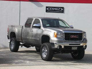 Lifted GMC truck featuring performance offroad parts and ORU accessories.