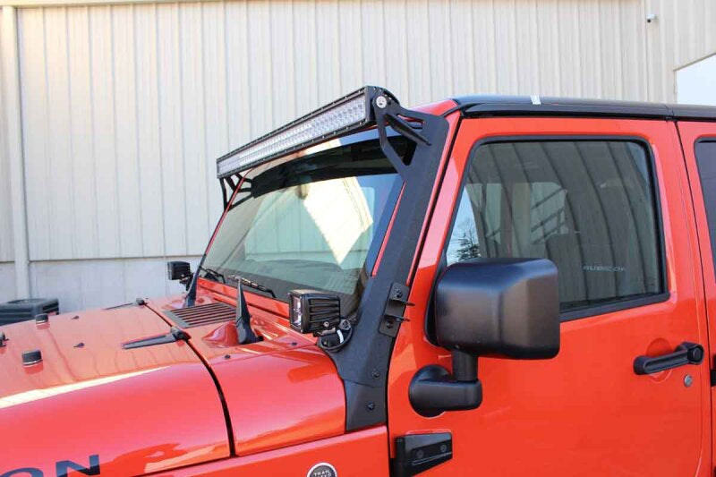 Fishbone Offroad 07-18 Jeep Wrangler JK 52In Light Bar Bracket installed on Jeep with offroad lighting