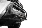 Addictive Desert Designs2024+ Toyota Tacoma Stealth Center Mount Winch Front Bumper w/ Top Hoop close-up view with light bar