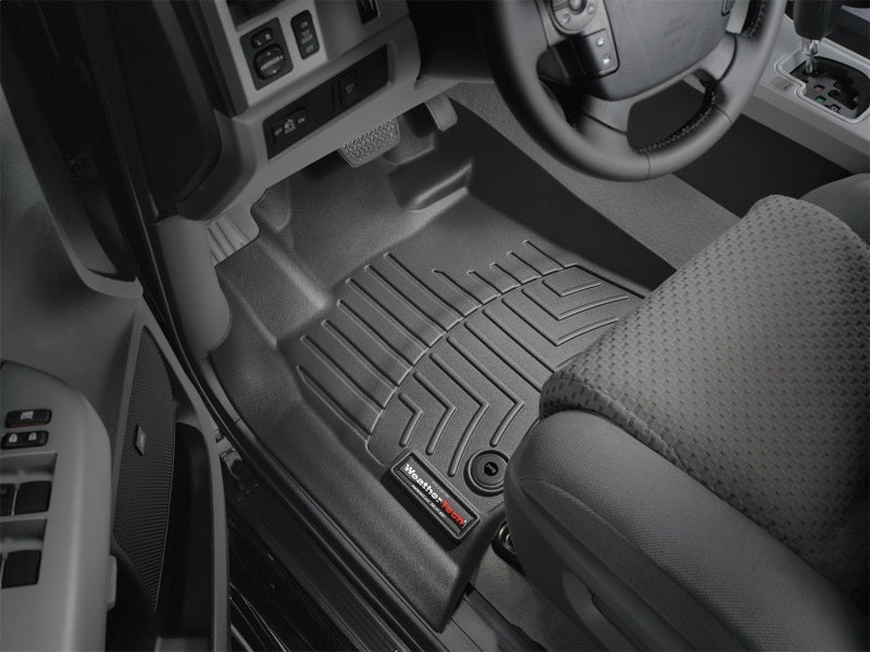 WeatherTech 12-21 Toyota Tundra Front FloorLiner - Black installed in a truck interior.