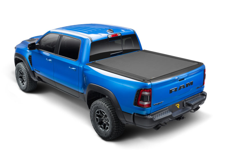 BAK 09-18 Dodge Ram (19-20 Classic) w/o Ram Box Revolver X4s 6.4ft Bed Cover (2020 New Body Style) on blue truck Main image