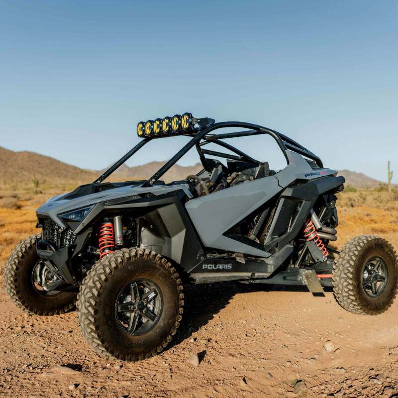 KC HiLiTES 2022+ Polaris RZR Pro XP 39in. Pro6 Gravity LED 6-Light 120w Combo Beam on off-road terrain.