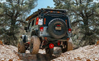MagnaFlow 12-18 Jeep Wrangler 2.5in Overland Series Cat-Back Exhaust on off-road vehicle