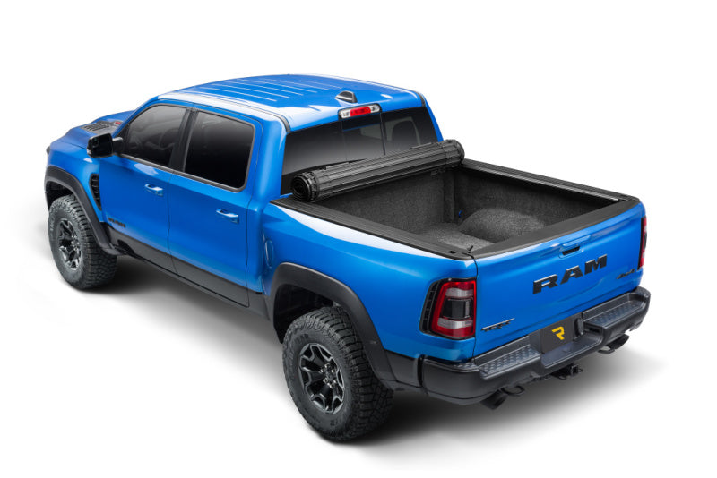 BAK 09-18 Dodge Ram (19-20 Classic) w/o Ram Box Revolver X4s 6.4ft Bed Cover (2020 New Body Style) on blue truck