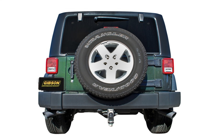 Gibson 07-17 Jeep Wrangler JK Sport 3.8L 2.5in Cat-Back Dual Extreme Exhaust - Black Elite (Ceramic) rear view.