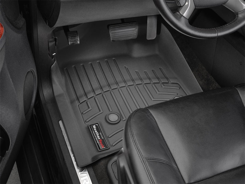 WeatherTech 07+ Chevrolet Avalanche Front FloorLiner - Black in a truck interior.