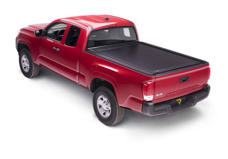 Retrax 2024 Toyota Tacoma 5ft Bed RetraxONE MX on red truck Main image