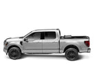 BAK 08-16 Ford Super Duty 6ft 9in Bed BAKFlip MX4 Matte Finish truck side view with exterior accessories for trucks.
