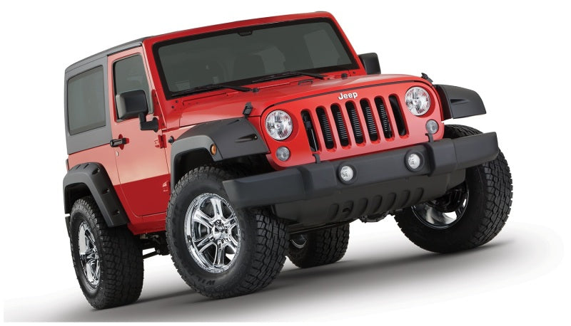 Bushwacker 07-18 Jeep Wrangler Pocket Style Flares 2pc - Black on red Jeep Wrangler with offroad wheels