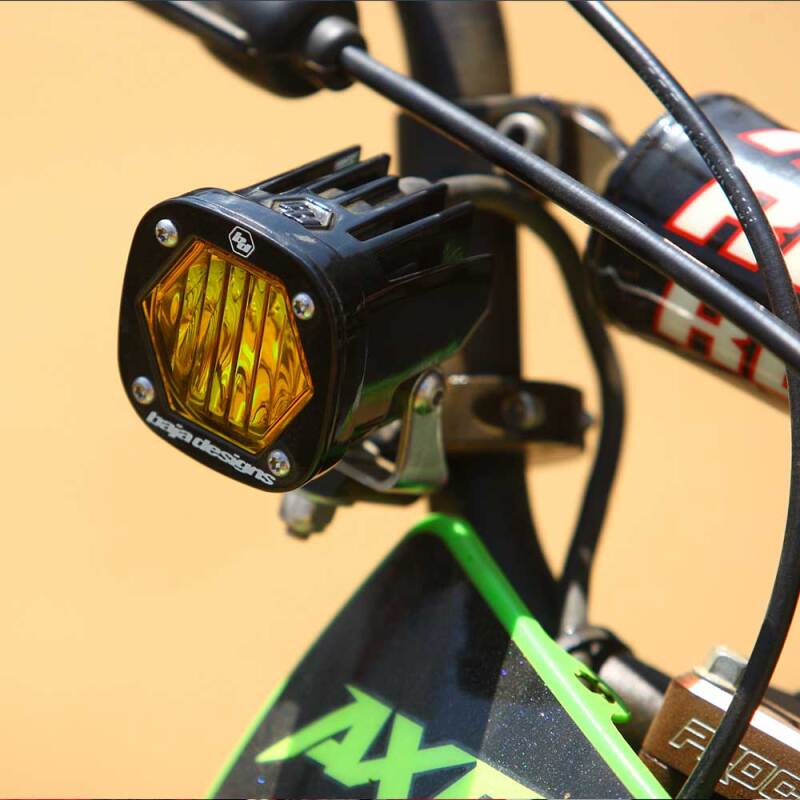 Baja Designs S1 Wide Cornering Electric Start Pit Bike LED Light - Amber installed on off-road bike