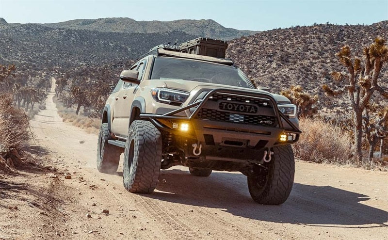 MagnaFlow Stainless Overland Cat-Back Exhaust 16-21 Toyota Tacoma on offroad terrain