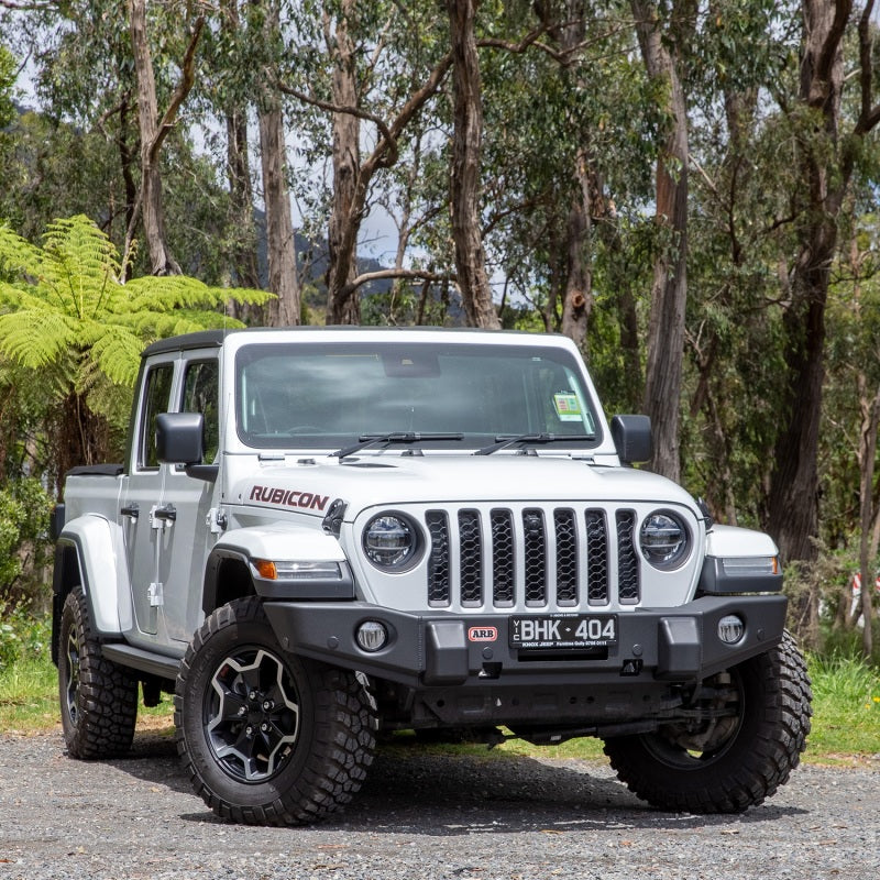 ARB 87-96 Jeep Wrangler YJ/ 97-06 Jeep Wrangler TJ Multi-fit Winch Bumper on Jeep Gladiator Rubicon with offroad tires.