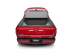 BAK 21-22 Ford F-150 (Incl. 2022 Lightning) BAKFlip MX4 5.7ft Bed Cover - Matte Finish on red truck
