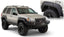 Bushwacker 99-04 Jeep Grand Cherokee Cutout Style Flares 2pc - Black on customized off-road Jeep with performance upgrades