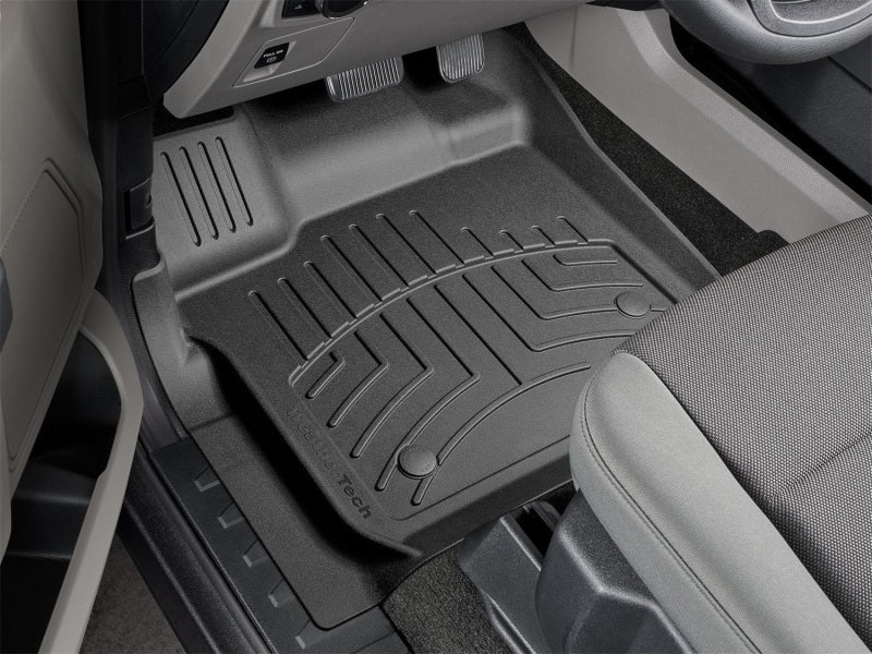 WeatherTech 2015+ Ford F-150 SuperCrew / SuperCab Front FloorLiner HP - Black in vehicle footwell Main image