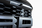 Addictive Desert Designs 21-22 Ford Raptor Adaptive Cruise Control Relocation Bracket on truck grille