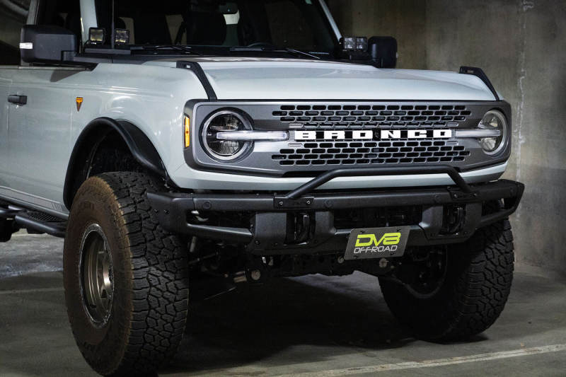 DV8 Offroad 21-22 Ford Bronco Factory Front Bumper Licence Relocation Bracket - Front on offroad vehicle