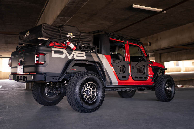 DV8 Offroad 18-22 Jeep Wrangler JL/JT Spec Series Half Doors - Rear Set in parking garage with offroad tires and gear.