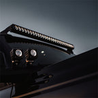 Rigid Industries Revolve 50in Bar w/Amber Trim Ring on offroad truck