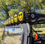 KC HiLiTES 6in. Hard Cover for Gravity Pro6 LED Lights (Single) - Smiley Face- Yellow/Black KC Logo on off-road vehicle roof