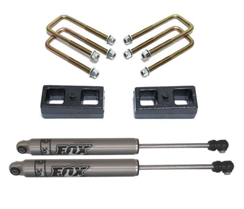 MaxTrac 04-18 Nissan Titan 2WD 2in Rear Lift Kit components including Fox shocks and lift blocks.