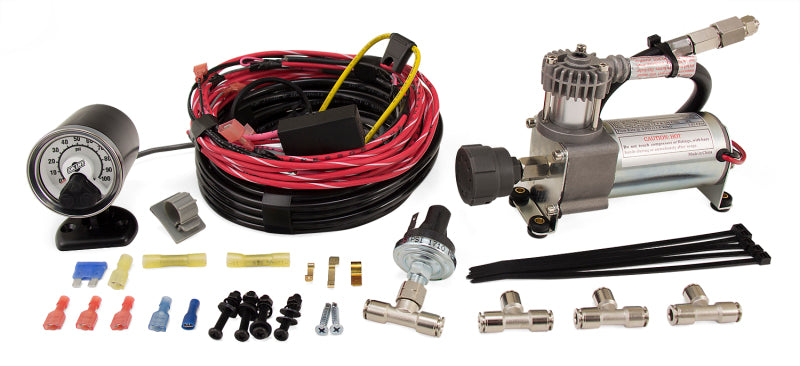 Air Lift Load Controller Single Heavy Duty Compressor kit with installation accessories and wiring.