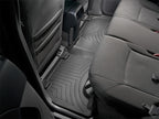 WeatherTech 03-09 Toyota 4Runner Rear FloorLiner - Black in vehicle interior, offering superior protection and fit.