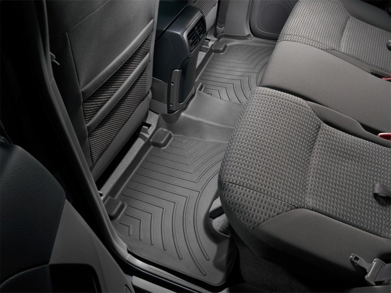 WeatherTech 03-09 Toyota 4Runner Rear FloorLiner - Black in vehicle interior, offering superior protection and fit.