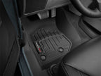 WeatherTech 14+ Jeep Wrangler Front FloorLiner - Black installed in vehicle cabin