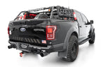Addictive Desert Designs17-20 Ford F-150 Raptor Phantom Front Bumper on offroad truck with accessories.