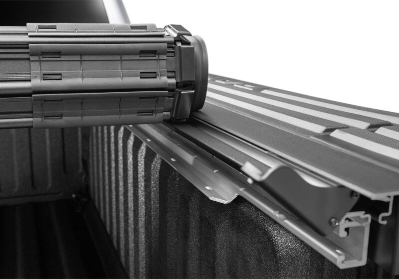 BAK 19-21 Dodge Ram w/ Ram Box Revolver X4s 5.7ft Bed Cover installation close-up image.