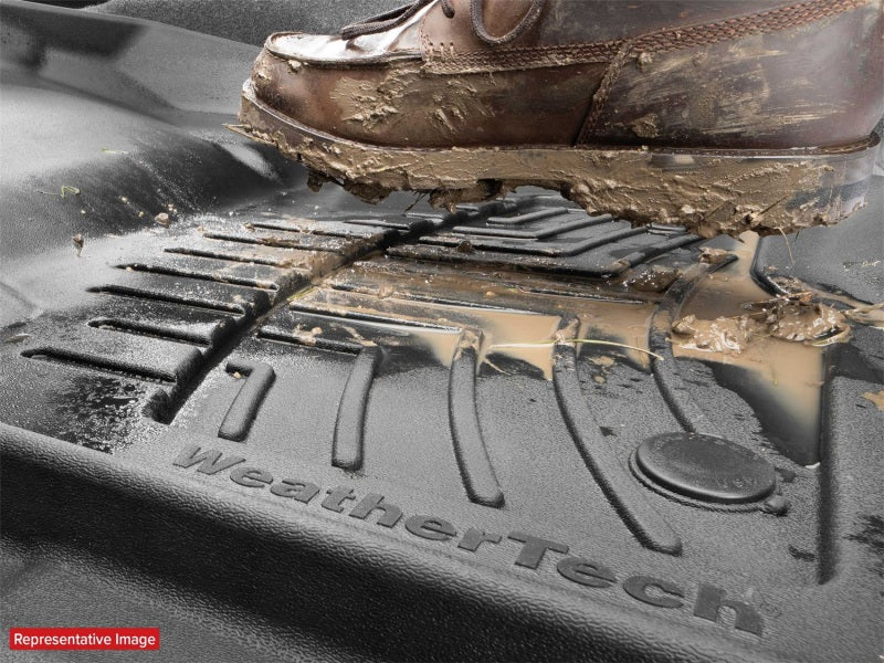 WeatherTech 2019+ RAM 2500/3500 Crew Cab/Mega Cab Front FloorLiner HP - Black with mud on rubber surface