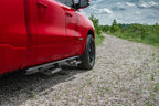 N-Fab Predator Pro Step System 2019 Dodge Ram 2500/3500 Crew Cab All Beds Gas/Diesel - Tex. Black on a red truck