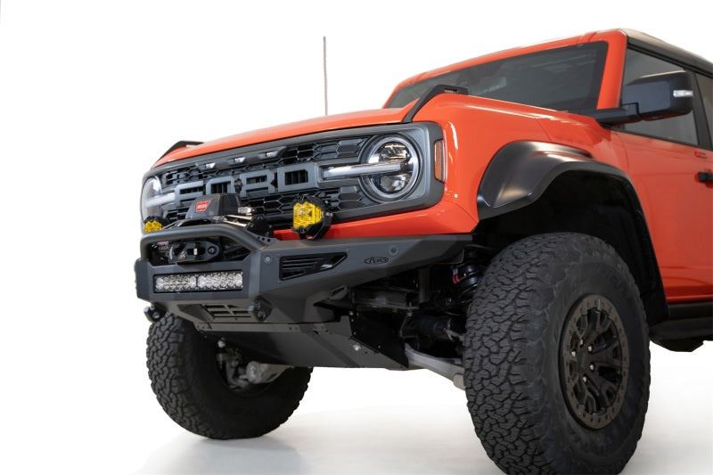Addictive Desert Designs 22-23 Ford Bronco Raptor Rock Fighter Skid Plate with off road parts and accessories.