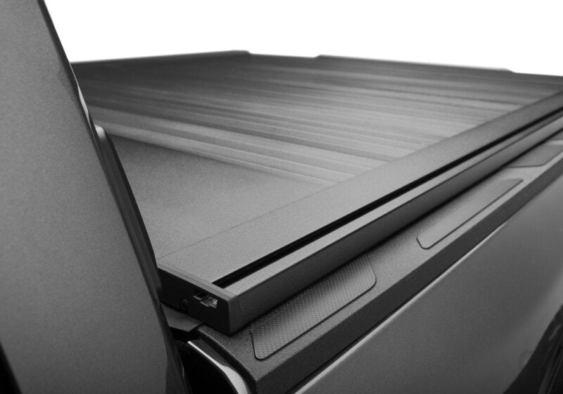 Retrax 2024 Ford F-150 SuperCrew/Super Cab 5.5ft. Bed Retrax EQ in black finish, highlighting durable aluminum construction.