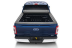 BAK 21-22 Ford F-150 (Incl. 2022 Lightning) Revolver X4s 5.7ft Bed Cover installed on a blue Ford truck.