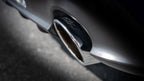 Close-up of Borla 22-23 Subaru BRZ/Toyota GR86 2.4L RWD AT/MT ATAK Catback Exhaust - Polished Tips on a vehicle.