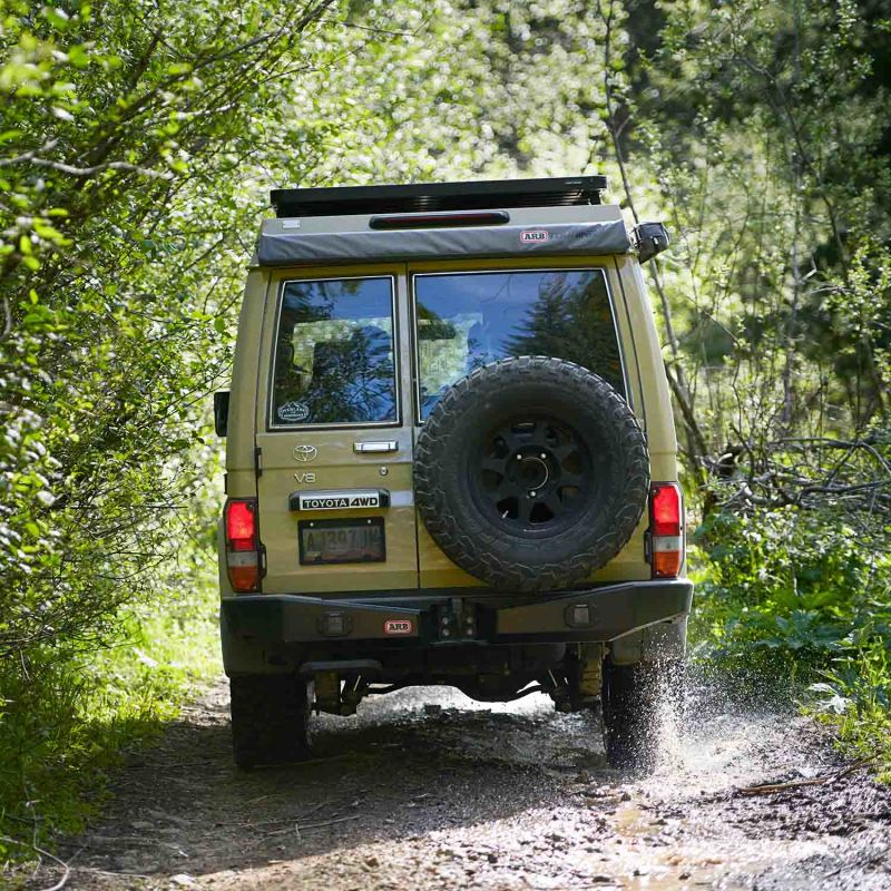 ARB Awning Pvc Bag 1.25M49Lg Usa/Ca Spec 1250X2100mm49X83 on off-road vehicle in nature