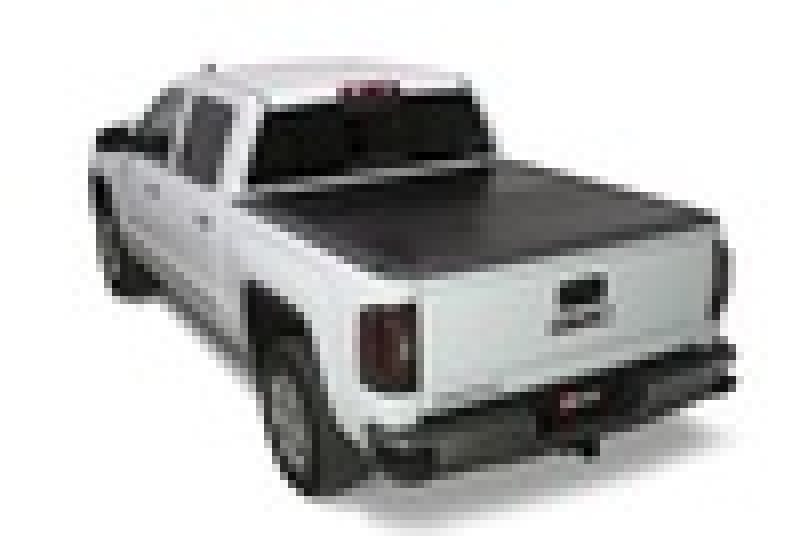 BAK 88-14 Chevy Silverado & C/K 8ft Bed (2014 HD / 2500 / 3500) BAKFlip G2 truck bed cover installed on a white pickup truck.