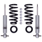 Bilstein 07-13 Chevrolet Avalanche/Silverado 1500 B8 6112 Front Suspension Kit components including shock absorbers and coil springs.