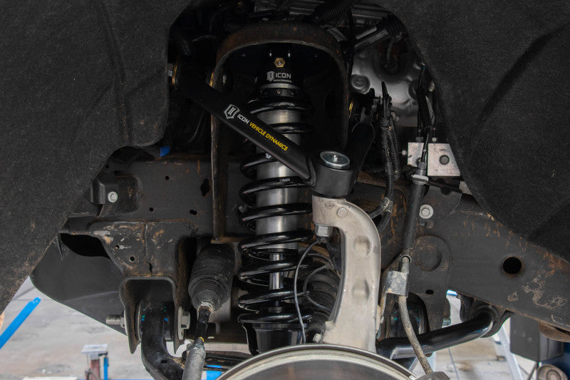 ICON 2019+ GM 1500 Tubular Upper Control Arm Delta Joint Kit installed in suspension system.