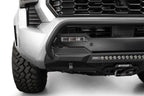 Addictive Desert Designs2024+ Toyota Tacoma Stealth Center Mount Winch Front Bumper w/ Top Hoop with winch and fog lights.