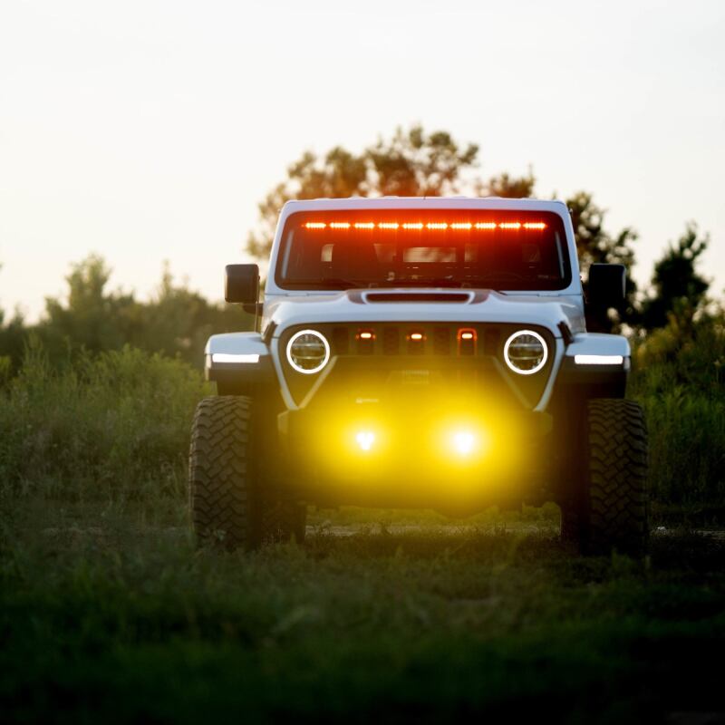 KC HiLiTES FLEX ERA 3 Dual Mode SAE Fog Lights - 2-Light Master Kit for Jeep Aftermarket Bumpers on a lifted Jeep Gladiator.