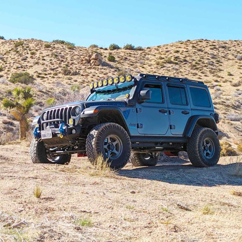 KC HiLiTES 2021+ Jeep Wrangler 4XE 50in Overhead Light Bar Mounting Bracket Set on off road terrain