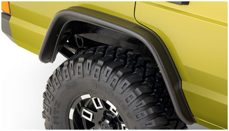 Bushwacker 84-01 Jeep Cherokee Flat Style Flares 4pc - Black on offroad tires