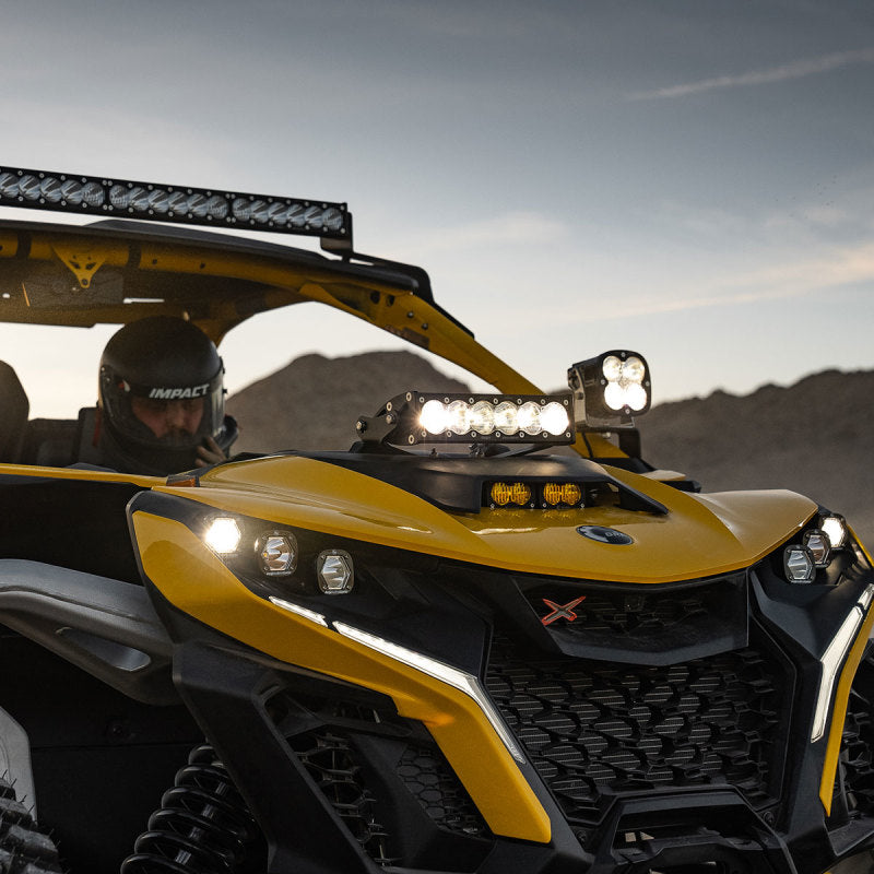 Baja Designs Can-Am Maverick R Clear 10in OnX6+ Shock Tower Kit mounted on ATV