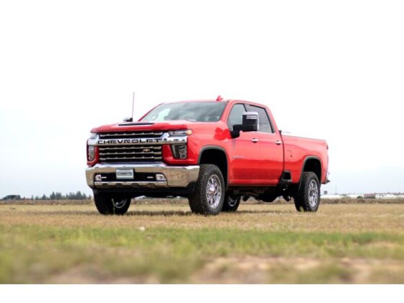 Cognito 20-24 Chevy/GMC Silverado/Sierra 2500/3500 HD 2WD/4WD 2in Economy Leveling Kit installed on red truck.